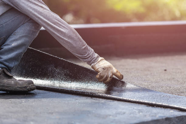 Professional Exterior Waterproofing technician working in Woodbury, NY